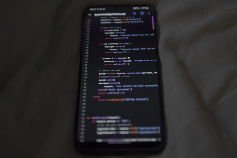 Developer working on a no-code app interface on a laptop screen