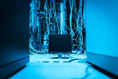 Rows of servers in a data center representing AI inference infrastructure