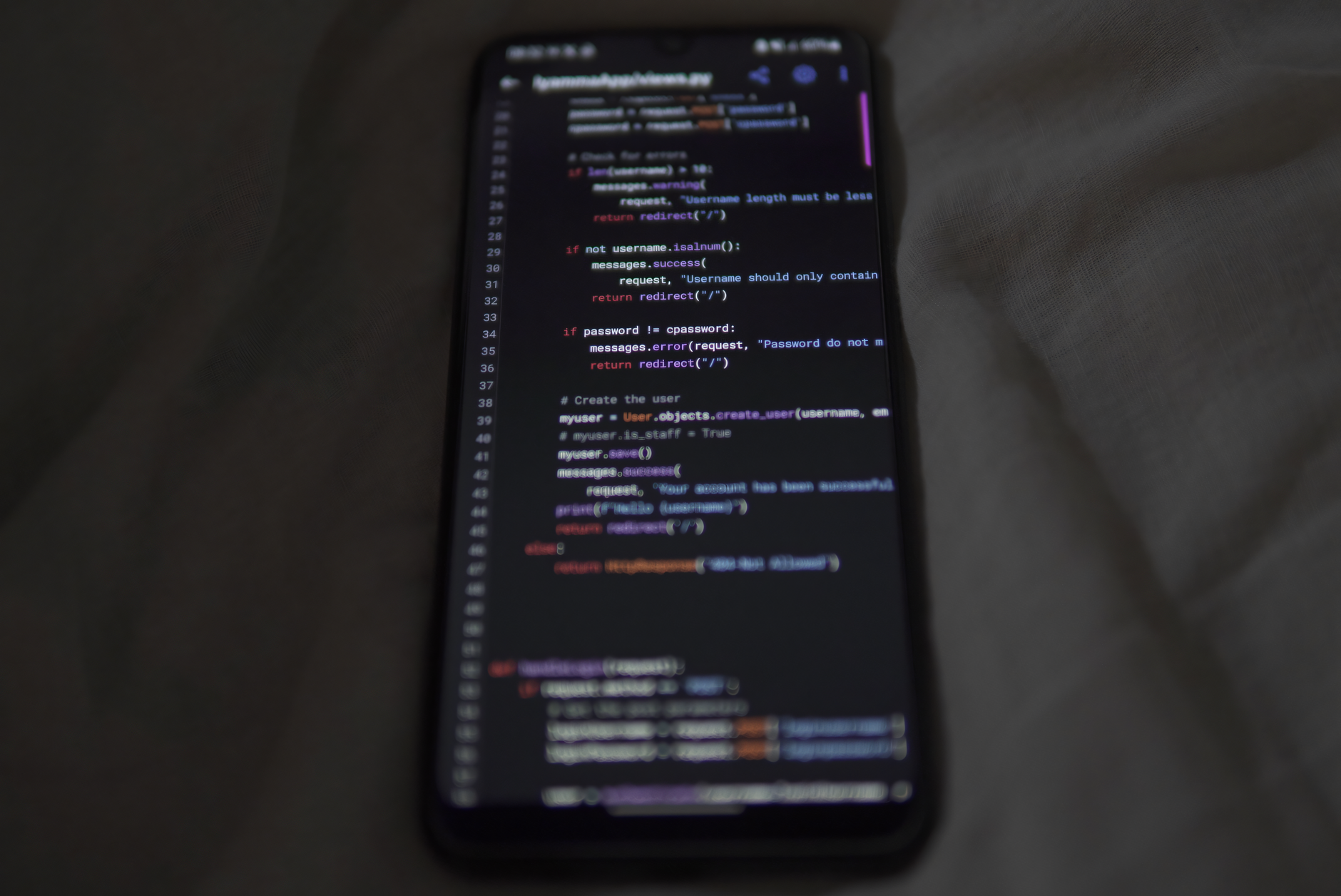 Developer working on a no-code app interface on a laptop screen