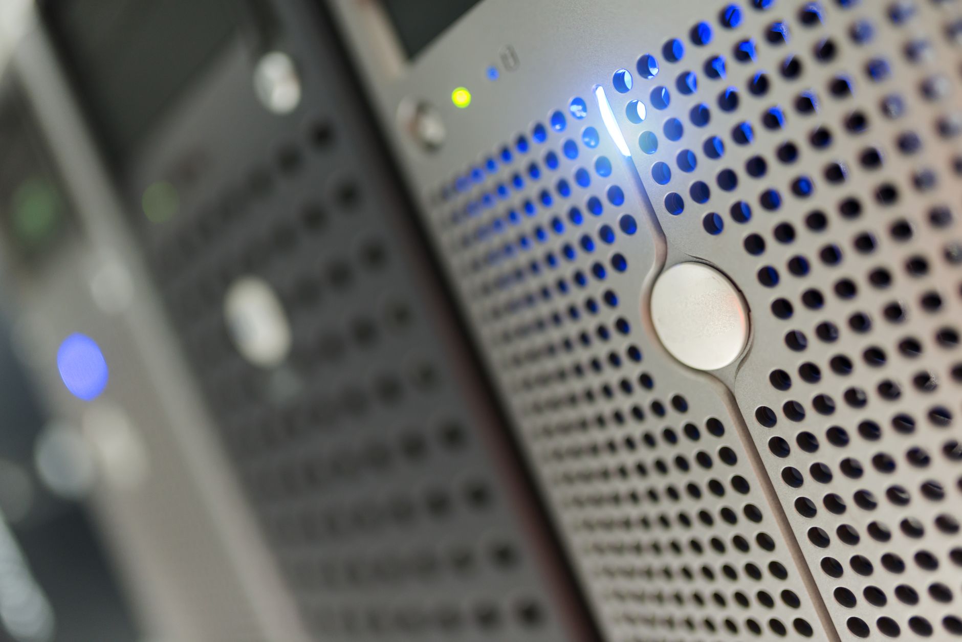 Server room with blue lighting symbolizing data privacy and cloud infrastructure