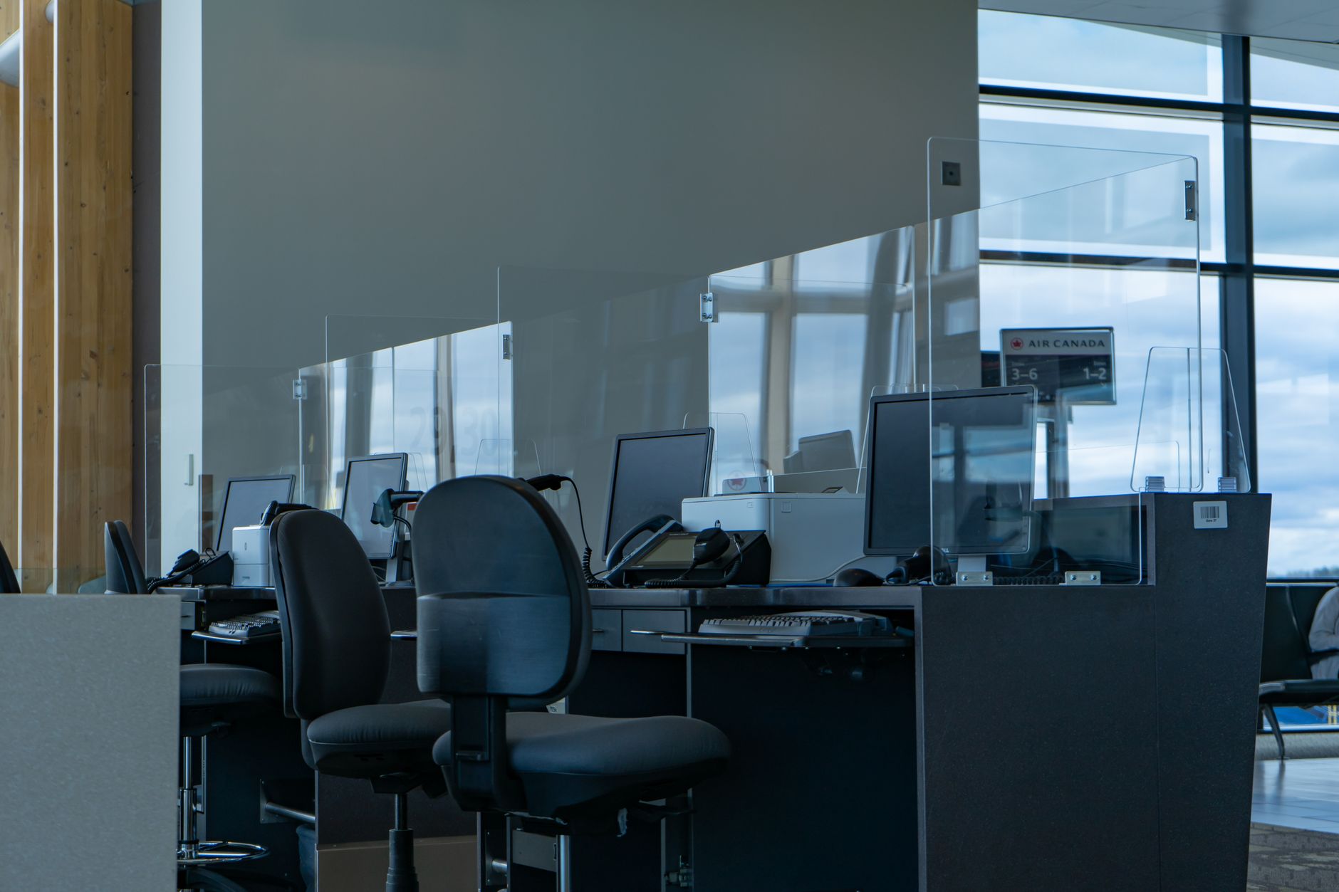 A clean desk setup with a monitor showing a writing application