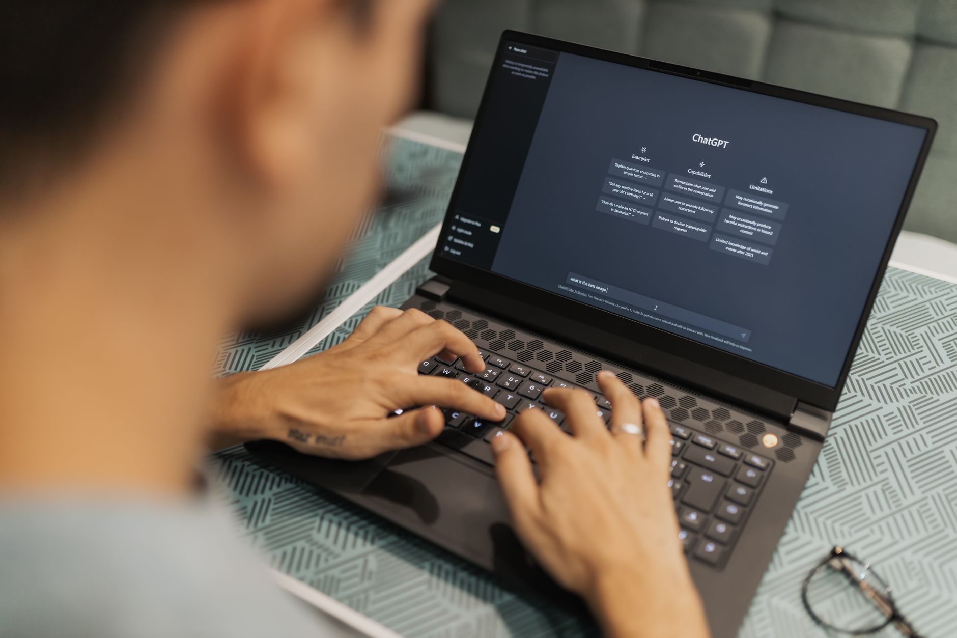Person interacting with an AI-powered software tool on a desktop screen