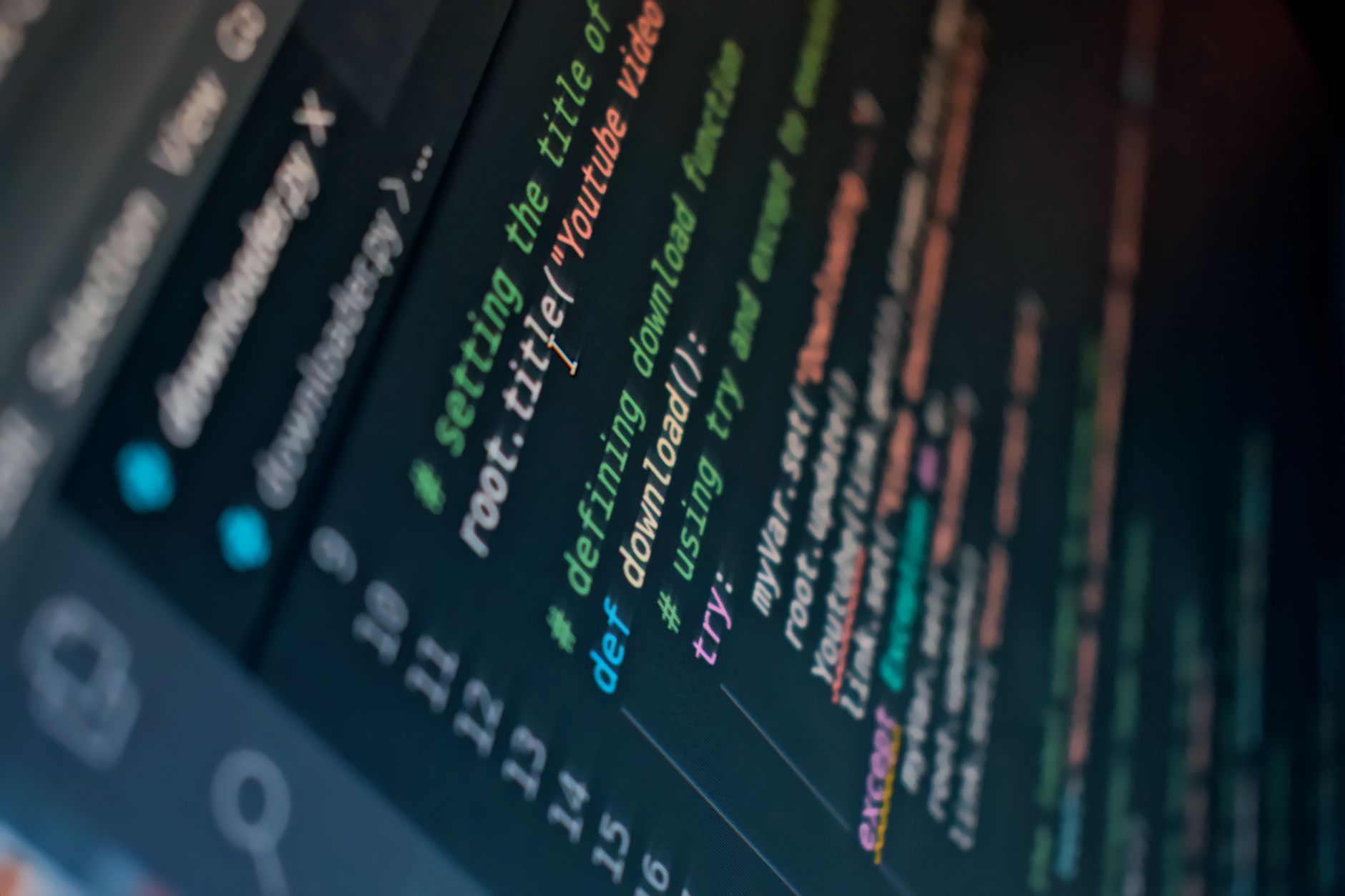 Close-up of code on a computer monitor showing a software development environment