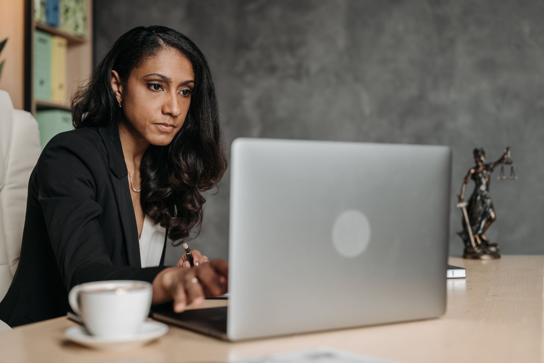 Legal professional working with technology tools for document review and analysis