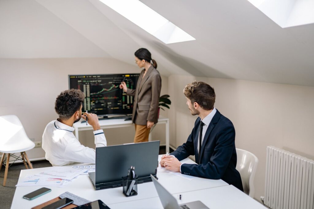 Brex’s Finance Platform Is Quietly Cornering Ramp’s Mid-Market Base Finance team working in a modern corporate office environment