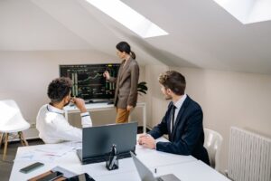 Brex’s Finance Platform Is Quietly Cornering Ramp’s Mid-Market Base Finance team working in a modern corporate office environment