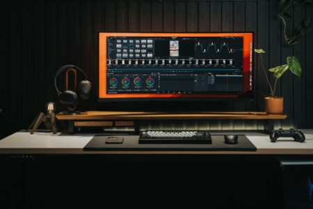 Runway’s Video AI Is Quietly Pulling Budgets from Adobe Premiere’s Creator Base A professional video editing workstation with multiple monitors showing timeline software