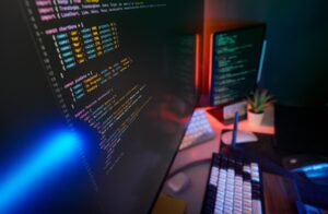 Dopt’s Onboarding SDK Is Quietly Undercutting Appcues’ Growth Base Developer working at a computer with multiple screens showing code and UI components