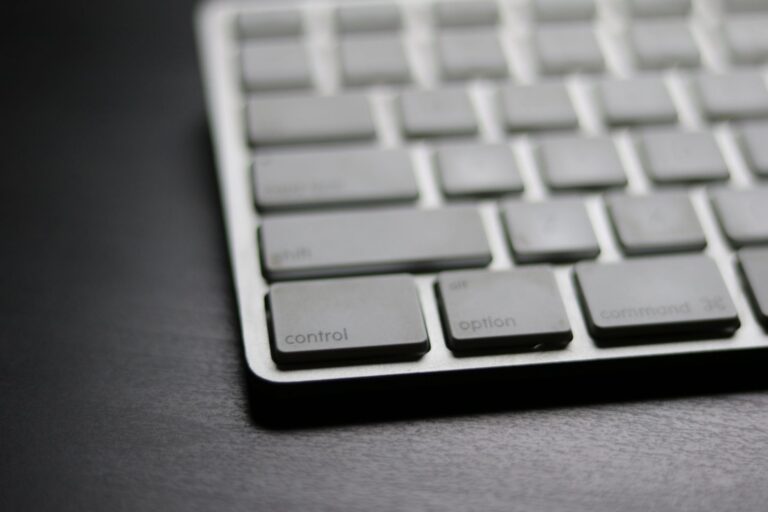 Raycast’s Productivity Layer Is Quietly Cornering Notion’s Power User Base A clean Mac desk setup with keyboard, representing keyboard-driven productivity tools