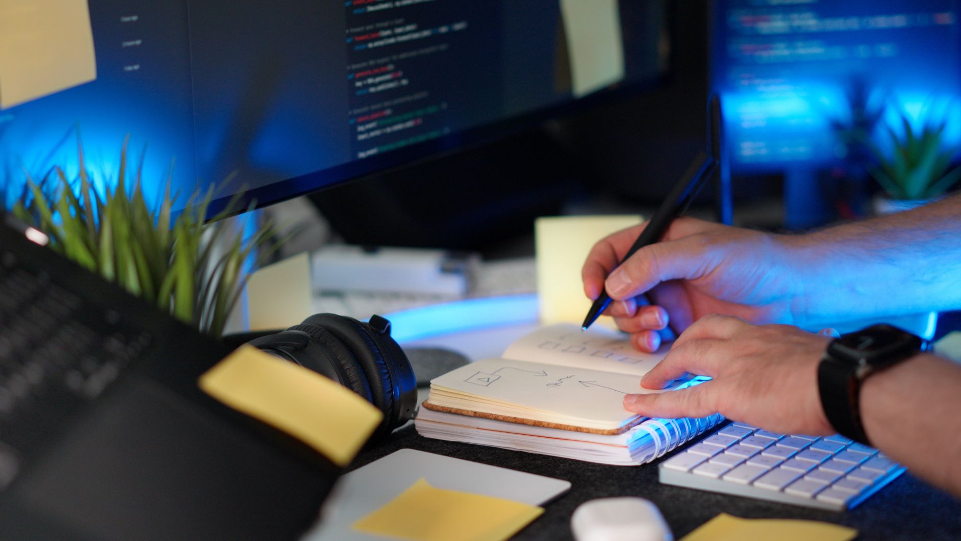 Close-up of code and technical documentation on a monitor