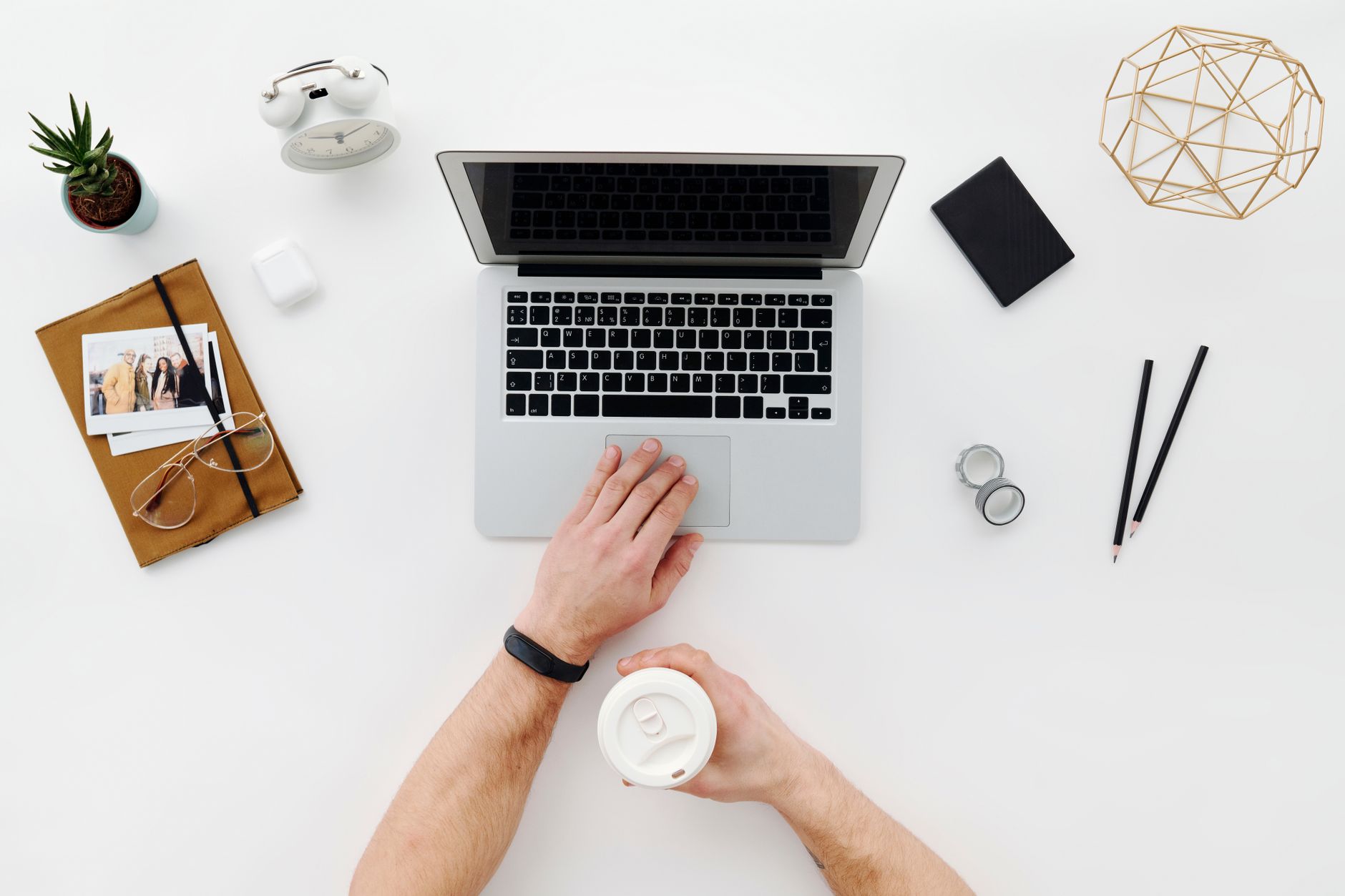 Clean modern startup workspace with computer and minimal desk setup