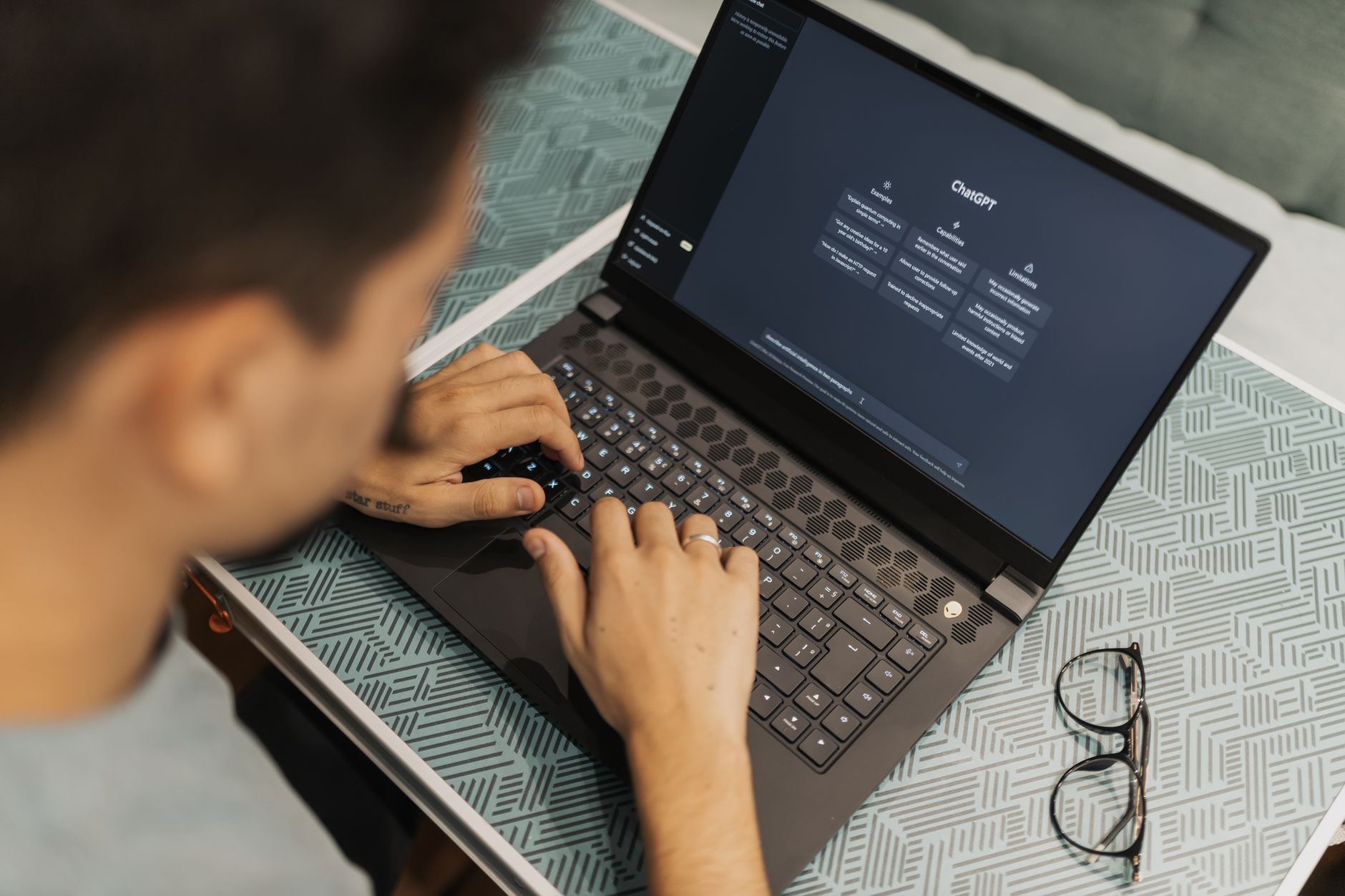 Person using an AI-powered interface on a laptop computer