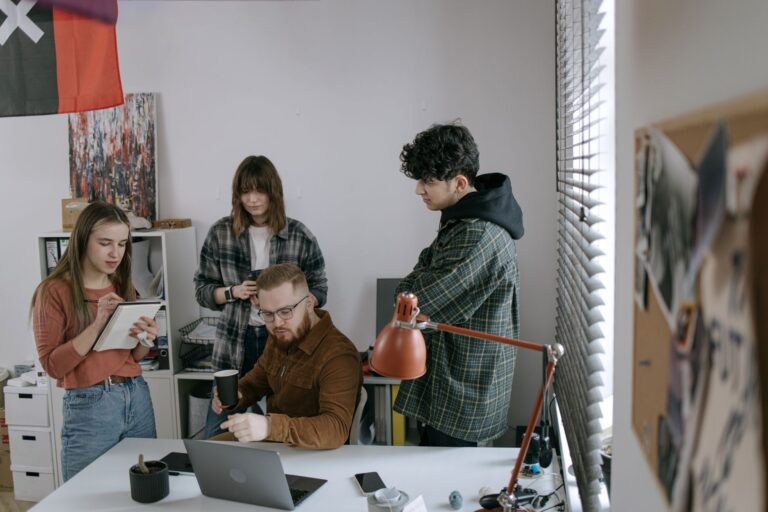 Decent’s Health Benefits Layer Is Quietly Cornering Gusto’s SMB Base Small business owner reviewing documents at a desk in a modern office