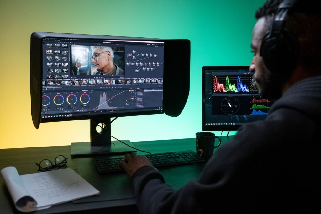 Runway ML’s Stagnation Is Quietly Handing Kling AI Its Creator Base A professional video editing setup with multiple monitors showing timeline software