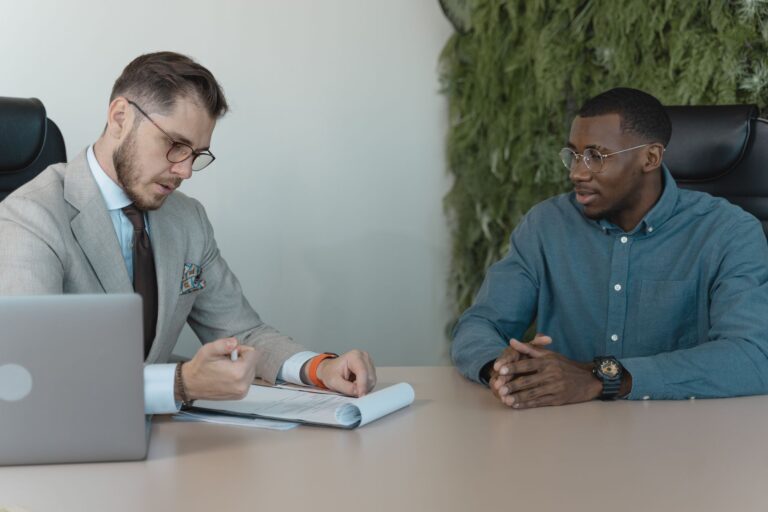 Mercor’s AI Hiring Layer Is Quietly Undercutting Deel’s Talent Base Two professionals conducting a job interview in a modern office setting