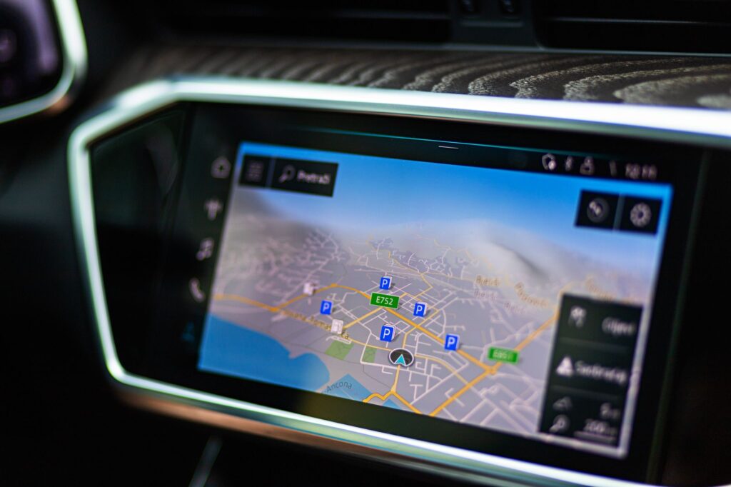 Developer looking at a digital map interface on a computer screen