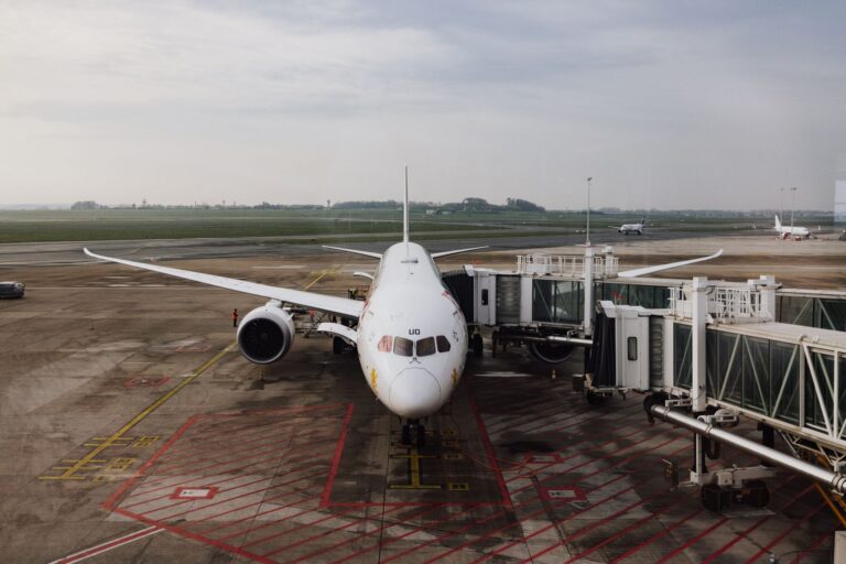 Navan’s Travel Management Layer Is Quietly Cornering Concur’s Enterprise Base Business traveler walking through a modern airport terminal with a carry-on bag