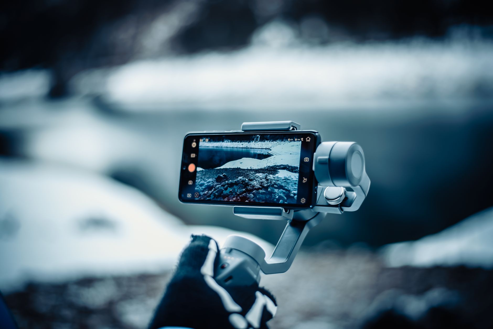 Creator filming vertical video content on a smartphone
